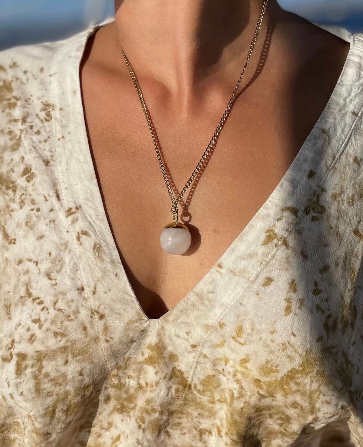 GLOBE NECKLACE